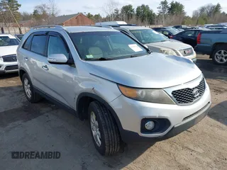 2012 Kia Sorento LX with VIN 5XYKTDA68CG215084, listed as a IAAI auction lot 41783121 with 213,223 mi miles. Bid and sale history available at carsss.com. Image 1.