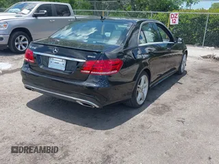 2014 Mercedes-Benz E 350 Sport with VIN WDDHF5KB8EA905977, listed as a IAAI auction lot 42529185 with 133,071 mi miles and . Bid and sale history available at DreamBid. Image 4.