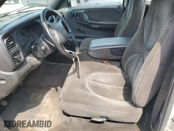 1999 Dodge Dakota SLT z VIN 1B7FL26X3XS170126, wystawiony jako Copart lot #54621095 z przebiegiem 192 965 mil mil oraz Szkoda całkowita • Salvage title. Historia ofert i sprzedaży dostępna na DreamBid. Obrazek 7.
