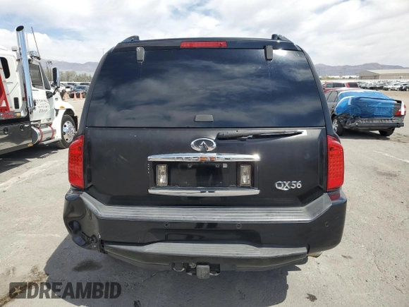2005 Infiniti QX56 z VIN 5N3AA08C65N800718, wystawiony jako Copart lot #54229265 z przebiegiem 222 803 mil mil oraz Szkoda całkowita • Salvage title. Historia ofert i sprzedaży dostępna na DreamBid. Obrazek 6.