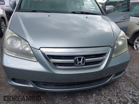 2007 Honda Odyssey EX-L with VIN 5FNRL38747B121059, listed as a IAAI auction lot 42211056 with 171,838 mi miles and . Bid and sale history available at DreamBid. Image 6.
