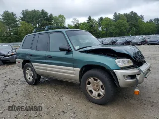 2000 Toyota RAV4 with VIN JT3GP10V5Y0044829, listed as a Copart auction lot 57051405 with 218,839 mi miles and Clean title. Bid and sale history available at DreamBid. Image 4.