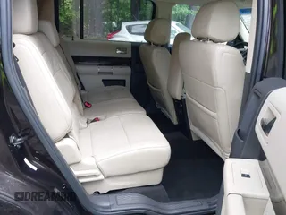 2013 Ford Flex SEL z VIN 2FMGK5C8XDBD31143, wystawiony jako IAAI lot #42243104 z przebiegiem 188 998 mil mil oraz . Historia ofert i sprzedaży dostępna na DreamBid. Obrazek 8.