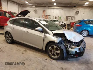 2016 Ford Focus SE with VIN 1FADP3KE2GL377824, listed as a IAAI auction lot 41461648 with 112,038 mi miles and . Bid and sale history available at carsss.com. Image 1.