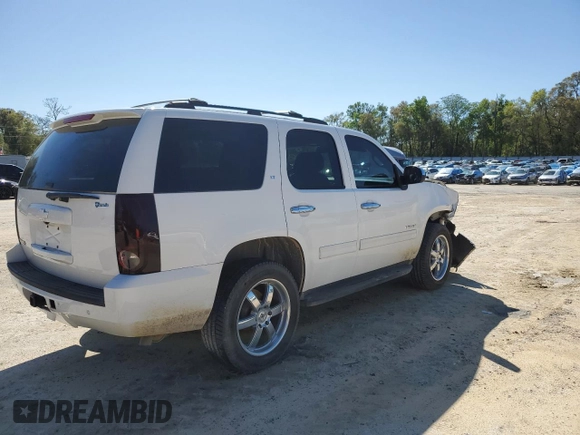 2014 Chevrolet Tahoe LT with VIN 1GNSCBE08ER192587, listed as a Copart auction lot 49216975 with 178,595 mi miles and Salvage title. Bid and sale history available at DreamBid. Image 3.