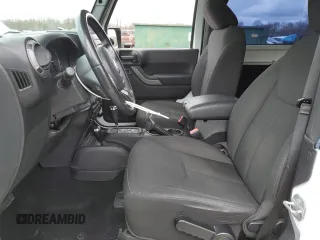 2015 Jeep Wrangler Sport with VIN 1C4AJWAG5FL761338, listed as a Copart auction lot 53123515 with 93,677 mi miles and Salvage Title. Bid and sale history available at carsss.com. Image 7.