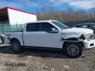 2018 Ford F-150 XL with VIN 1FTEW1E5XJFE20779, listed as a IAAI auction lot 41705616 with 138,996 mi miles and . Bid and sale history available at DreamBid. Image 13.