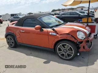 2014 MINI Roadster S z VIN WMWSY3C54ET595156, wystawiony jako Copart lot #68507474 z przebiegiem 43 608 mil mil oraz Tytuł czysty. Historia ofert i sprzedaży dostępna na DreamBid. Obrazek 4.