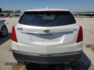2017 Cadillac XT5 FWD z VIN 1GYKNARS3HZ297366, wystawiony jako Copart lot #53908815 z przebiegiem 95 834 mil mil oraz Szkoda całkowita • Salvage title. Historia ofert i sprzedaży dostępna na DreamBid. Obrazek 6.