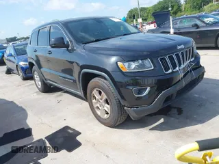 2014 Jeep Grand Cherokee Laredo with VIN 1C4RJEAG3EC182652, listed as a IAAI auction lot 41908481 with 164,080 mi miles. Bid and sale history available at carsss.com. Image 1.