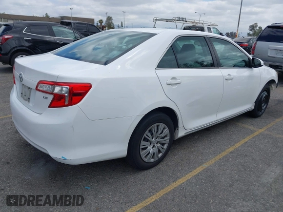 2014 Toyota Camry L with VIN 4T1BF1FK4EU403013, listed as a IAAI auction lot 42115089 with 221,686 mi miles and . Bid and sale history available at DreamBid. Image 4.