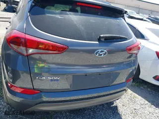 2016 Hyundai Tucson Limited with VIN KM8J33A24GU124543, listed as a IAAI auction lot 41808327 with 38,069 mi miles. Bid and sale history available at carsss.com. Image 17.