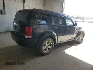 2009 Dodge Nitro SE z VIN 1D8GU28K89W545430, wystawiony jako Copart lot #50225085 z przebiegiem 143 938 mil mil oraz Szkoda całkowita • Salvage title. Historia ofert i sprzedaży dostępna na DreamBid. Obrazek 3.