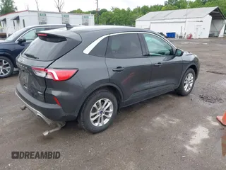 2020 Ford Escape SE with VIN 1FMCU9G64LUA25167, listed as a IAAI auction lot 42307557 with 82,524 mi miles and . Bid and sale history available at DreamBid. Image 4.
