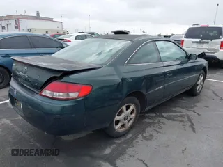 1999 Toyota Solara SE with VIN 2T1CF22P4XC129649, listed as a IAAI auction lot 42571054 with 89,922 mi miles and . Bid and sale history available at DreamBid. Image 4.