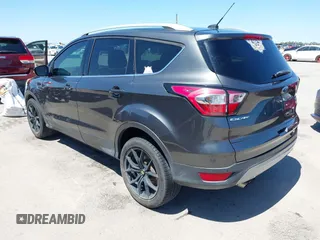 2017 Ford Escape Titanium with VIN 1FMCU0J97HUE07747, listed as a IAAI auction lot 41977788 with 104,560 mi miles. Bid and sale history available at carsss.com. Image 3.