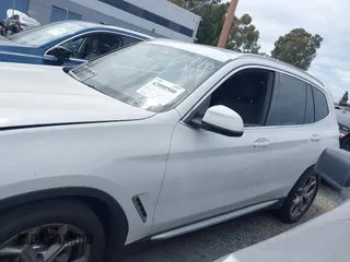 2021 BMW X3 sDrive30i z VIN 5UXTY3C09M9G57711, wystawiony jako IAAI lot #42000500 z przebiegiem 31 312 mil mil oraz . Historia ofert i sprzedaży dostępna na DreamBid. Obrazek 14.
