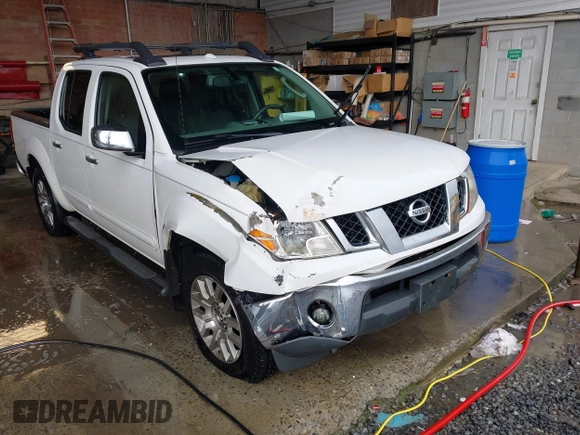 2011 Nissan Frontier Pro-4X with VIN 1N6AD0EV3BC409184, listed as a IAAI auction lot 42122823 with 209,669 mi miles and . Bid and sale history available at DreamBid. Image 1.