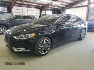 2017 Ford Fusion Titanium z VIN 3FA6P0K96HR124759, wystawiony jako Copart lot #61414395 z przebiegiem 175 655 mil mil oraz Czysty tytuł • Clean title. Historia ofert i sprzedaży dostępna na DreamBid. Obrazek 1.