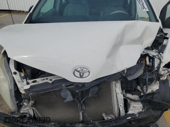 2012 Toyota Sienna with VIN 5TDZK3DC6CS244891, listed as a Copart auction lot 54442055 with 137,680 mi miles and Salvage title. Bid and sale history available at DreamBid. Image 12.