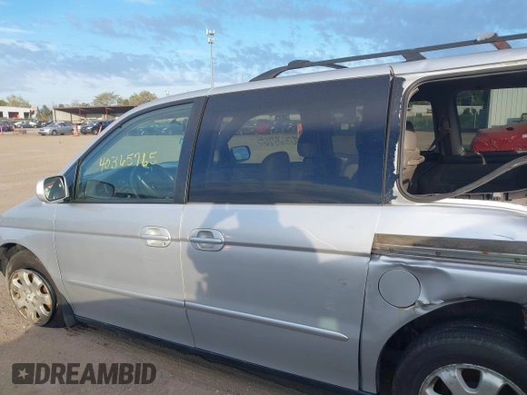 2003 Honda Odyssey EX-L with VIN 5FNRL18973B007802, listed as a IAAI auction lot 40365765 with 278,759 mi miles and . Bid and sale history available at DreamBid. Image 15.