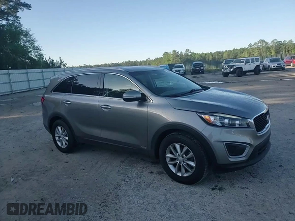 2017 Kia Sorento LX z VIN 5XYPGDA36HG263139, wystawiony jako Copart lot #52196675 z przebiegiem 89 401 mil mil oraz Szkoda całkowita • Salvage title. Historia ofert i sprzedaży dostępna na DreamBid. Obrazek 12.