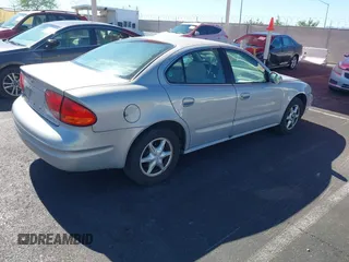 2000 Oldsmobile Alero GL2 z VIN 1G3NL52T6YC434404, wystawiony jako IAAI lot #42488982 z przebiegiem 110 828 mil mil oraz . Historia ofert i sprzedaży dostępna na DreamBid. Obrazek 4.