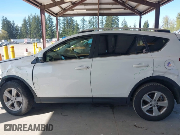 2014 Toyota RAV4 XLE with VIN JTMRFREV6EJ002755, listed as a IAAI auction lot 42021556 with 133,570 mi miles. Bid and sale history available at carsss.com. Image 14.