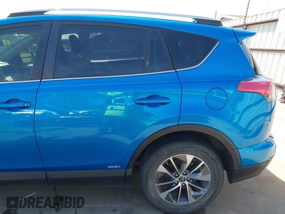 2016 Toyota RAV4 Hybrid XLE with VIN JTMRJREV5GD014170, listed as a IAAI auction lot 41822178 with 89,676 mi miles. Bid and sale history available at carsss.com. Image 20.