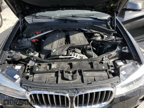 2017 BMW X4 M40i with VIN 5UXXW7C51H0U25766, listed as a Copart auction lot 77749324 with 101,289 mi miles and Salvage Title. Bid and sale history available at carsss.com. Image 12.