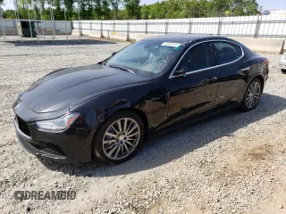 2015 Maserati Ghibli with VIN ZAM57XSA6F1130489, listed as a Copart auction lot 49330443 with 79,932 mi miles. Bid and sale history available at carsss.com. Image 1.