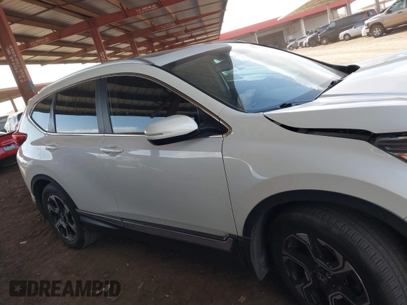 2017 Honda CR-V Touring with VIN 2HKRW1H97HH502128, listed as a IAAI auction lot 41939025 with 111,100 mi miles. Bid and sale history available at carsss.com. Image 13.