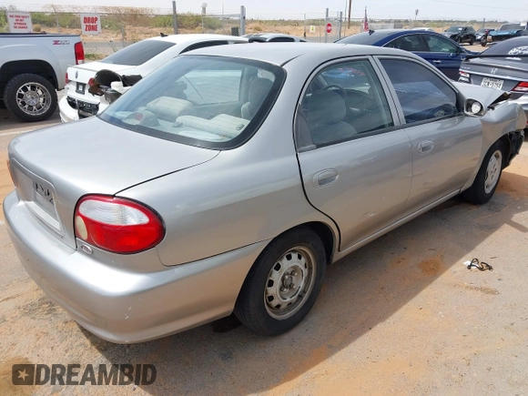 2001 Kia Sephia with VIN KNAFB121815081573, listed as a IAAI auction lot 42058297 with 112,069 mi miles and . Bid and sale history available at DreamBid. Image 4.