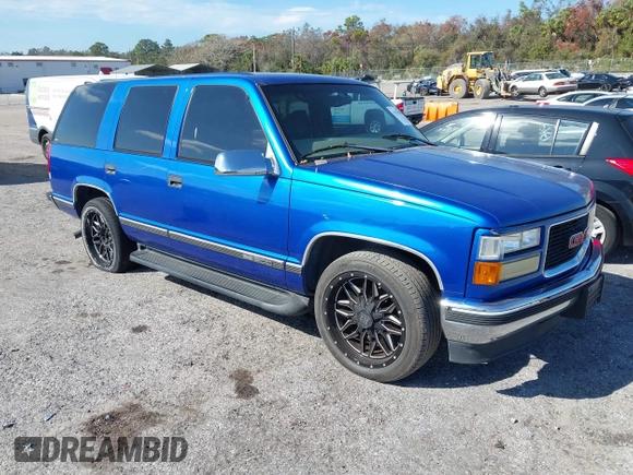 1997 GMC Yukon with VIN 1GKEC13R0VJ744958, listed as a IAAI auction lot 41474196 with 257,847 mi miles. Bid and sale history available at carsss.com. Image 1.