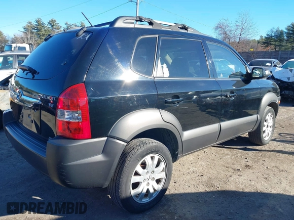 2007 Hyundai Tucson SE with VIN KM8JN72D17U590769, listed as a IAAI auction lot 41003503 with 143,462 mi miles and . Bid and sale history available at DreamBid. Image 4.