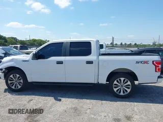 2018 Ford F-150 XL with VIN 1FTEW1CP8JKE91006, listed as a IAAI auction lot 42123840 with 76,806 mi miles and . Bid and sale history available at DreamBid. Image 15.