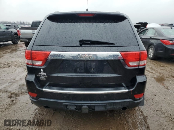 2013 Jeep Grand Cherokee Overland with VIN 1C4RJFCT9DC615096, listed as a Copart auction lot 86817074 with 112,421 mi miles and Salvage Title. Bid and sale history available at carsss.com. Image 6.