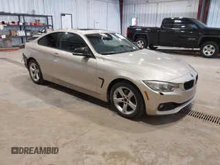 2014 BMW 4 Series 428i xDrive with VIN WBA3N9C58EF721677, listed as a IAAI auction lot 41804688 with 105,355 mi miles and . Bid and sale history available at DreamBid. Image 1.