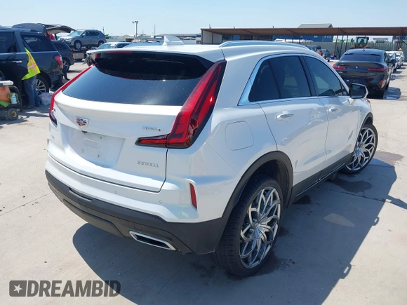 2024 Cadillac XT4 AWD Premium Luxury with VIN 1GYFZDR40RF100102, listed as a IAAI auction lot 41987175 with 4,935 mi miles and . Bid and sale history available at DreamBid. Image 4.