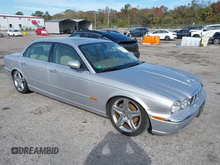 2005 Jaguar XJ with VIN SAJWA79C05SG45650, listed as a IAAI auction lot 41262315 with 76,127 mi miles. Bid and sale history available at carsss.com. Image 1.