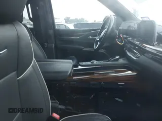 2023 Cadillac Escalade ESV 4WD Premium Luxury z VIN 1GYS4KKLXPR182760, wystawiony jako IAAI lot #42113165 z przebiegiem 156 960 mil mil oraz . Historia ofert i sprzedaży dostępna na DreamBid. Obrazek 5.