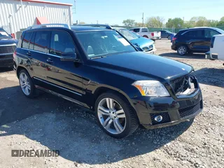 2012 Mercedes-Benz GLK with VIN WDCGG8HB6CF841198, listed as a IAAI auction lot 42021083 with 162,930 mi miles. Bid and sale history available at carsss.com. Image 1.