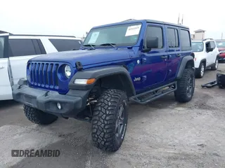 2019 Jeep Wrangler Unlimited Sport Altitude with VIN 1C4HJXDG6KW578572, listed as a IAAI auction lot 41921919 with 30,247 mi miles and . Bid and sale history available at DreamBid. Image 2.