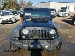 2018 Jeep Wrangler JK Unlimited Sport S with VIN 1C4HJWDG5JL928106, listed as a Copart auction lot 77670184 with 70,228 mi miles and Salvage Title. Bid and sale history available at carsss.com. Image 5.