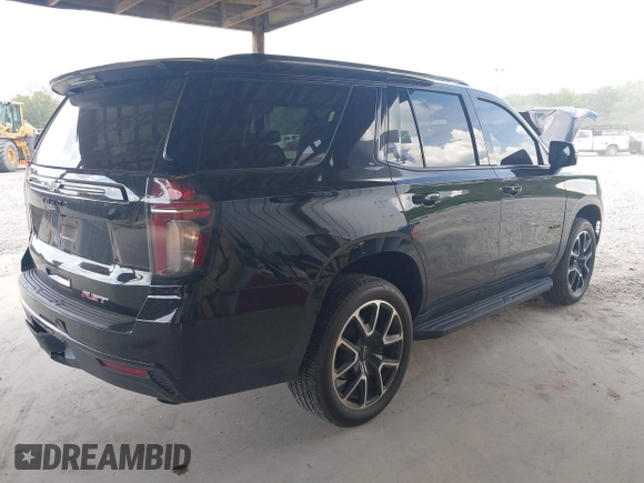 2023 Chevrolet Tahoe RST with VIN 1GNSCRKD2PR531394, listed as a IAAI auction lot 42147801 with 23,423 mi miles and . Bid and sale history available at DreamBid. Image 4.
