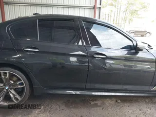 2018 BMW 5 Series M550i xDrive with VIN WBAJB9C51JB035949, listed as a IAAI auction lot 42085727 with Not provided miles and . Bid and sale history available at DreamBid. Image 12.