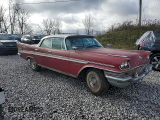1957 Chrysler New Yorker z VIN N5722394, wystawiony jako Copart lot #81414084 z przebiegiem 18 527 mil mil oraz Tytuł czysty. Historia ofert i sprzedaży dostępna na DreamBid. Obrazek 4.