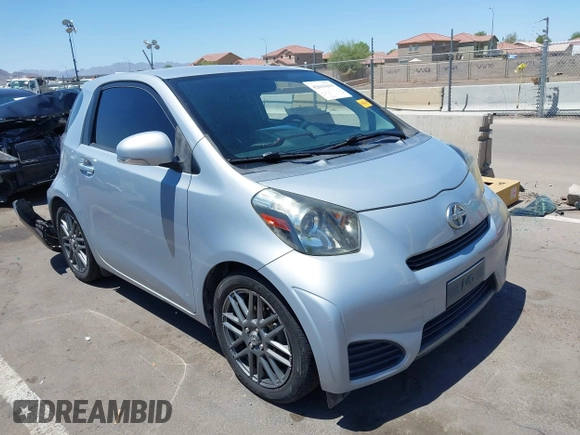 2014 Scion iQ with VIN JTNJJXB02EJ027026, listed as a IAAI auction lot 42619439 with 103,261 mi miles and . Bid and sale history available at DreamBid. Image 1.
