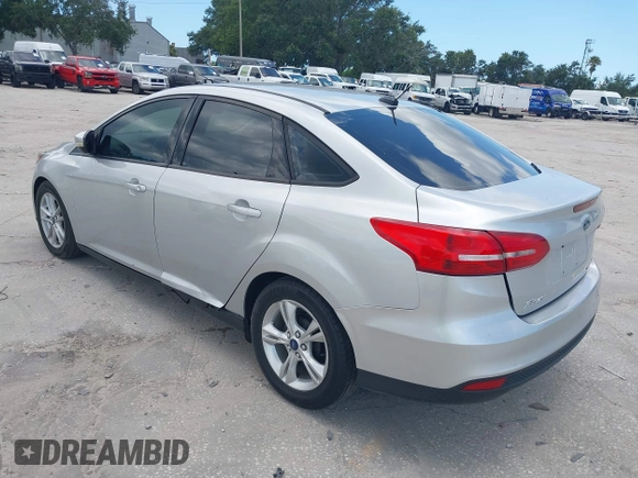 2015 Ford Focus SE with VIN 1FADP3F27FL215315, listed as a IAAI auction lot 42716234 with 118,645 mi miles and . Bid and sale history available at DreamBid. Image 3.