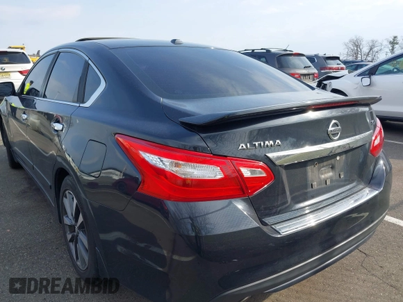 2016 Nissan Altima SR with VIN 1N4AL3AP3GC292783, listed as a IAAI auction lot 41876267 with 128,013 mi miles and . Bid and sale history available at carsss.com. Image 3.